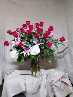 2 dozen roses, lilies and hydrangeas